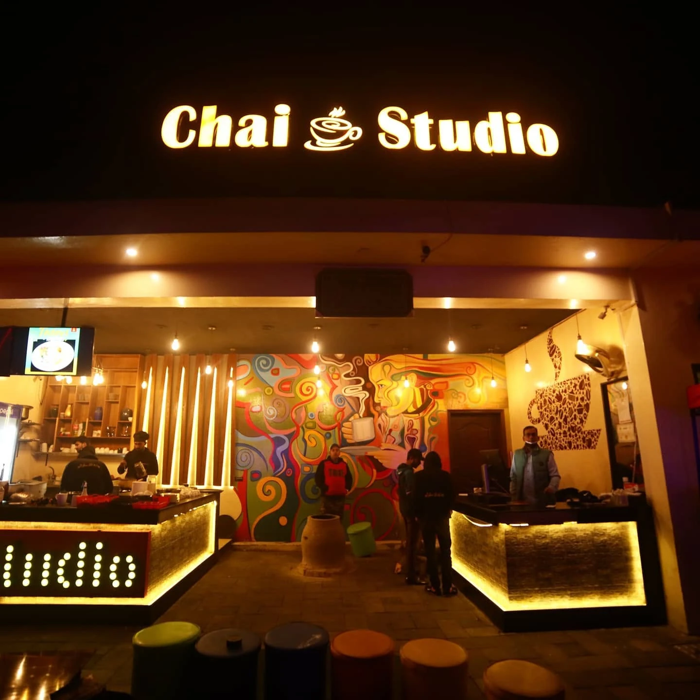 Chai Studio storefront at night